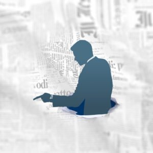 A silhouette of a confident business leader breaking through a background of text and pointing forward, representing the communication mastery and leadership skills gained from the 'Business Pack' online English course at read4more.com.