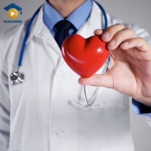 A doctor in a white coat with a stethoscope holds up a red heart symbol, representing a heart specialist (cardiologist). This image illustrates the medical English term 'specialist' for an OET preparation course on read4more.com.