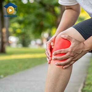 A close-up of a person clutching their knee with a red highlight indicating pain, visually defining the English vocabulary word for the leg joint for the Read4More online glossary.